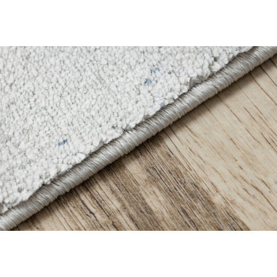 Covor original pentru living în culoarea albastru-aurie EMERALD