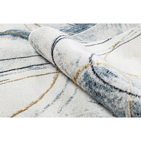 Covorul modelat pentru living în culoarea albastră