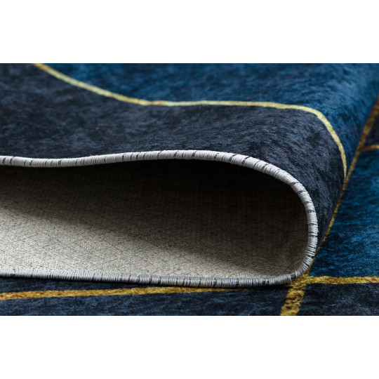 Covor ieftin de calitate, de culoare albastră, cu modele