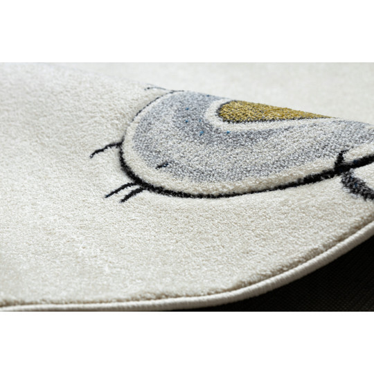 Un covor de calitate pentru copii de culoare bej cu un urs.