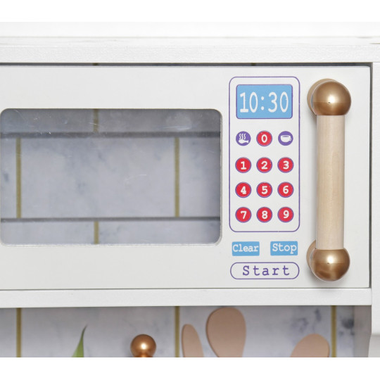 Cea mai bună bucătărie pentru copii din lemn, în culori alb-roz.