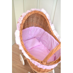 Carucior din material natural cu volan roz.