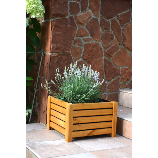 Uniquely wooden flower pot in light brown color