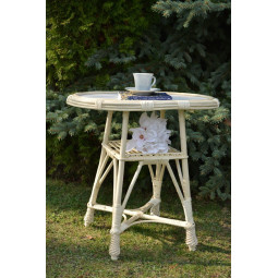 Meseș oval din nuanța de cafea cu blat alb.