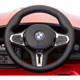 Mașină electrică pentru copii BMW M4 în culoarea albastră cu telecomandă