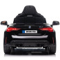 Mașină electrică pentru copii BMW M4 de culoare neagră cu telecomandă