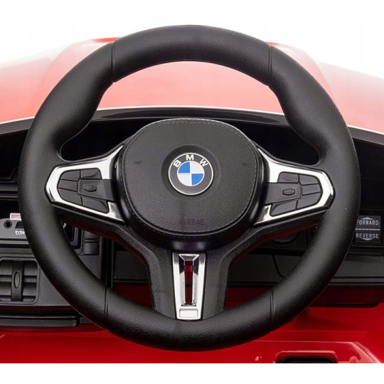 Mașină electrică pentru copii BMW M4 de culoare neagră cu telecomandă