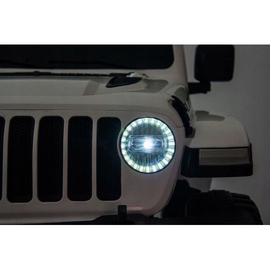 Mașină electrică pentru copii Jeep Wrangler de culoare roșie, cu scaun din piele și roți din EVA.