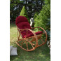 Scaun cu balansare din lemn cu împletitură albă și pernă roșie