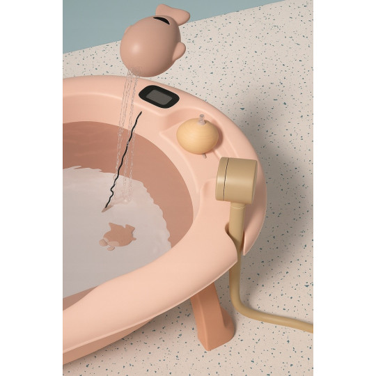 Baia Vaiana cu suport, termometru și jucărie de culoare roz pal.