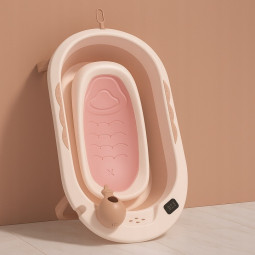 Baia Vaiana cu suport, termometru și jucărie de culoare roz pal.