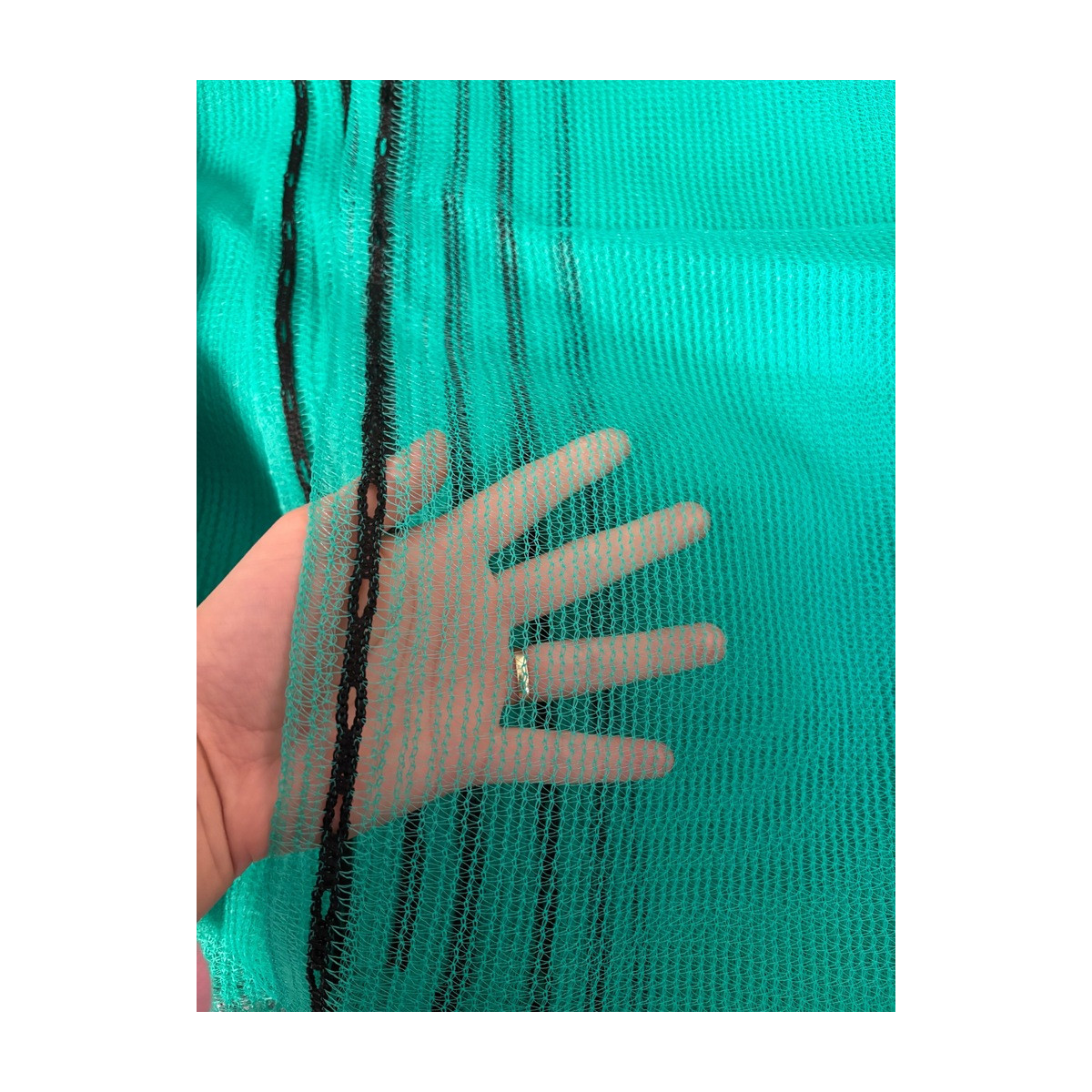 O rețea de protecție pentru schele, de culoare verde, 3,07 × 10 m