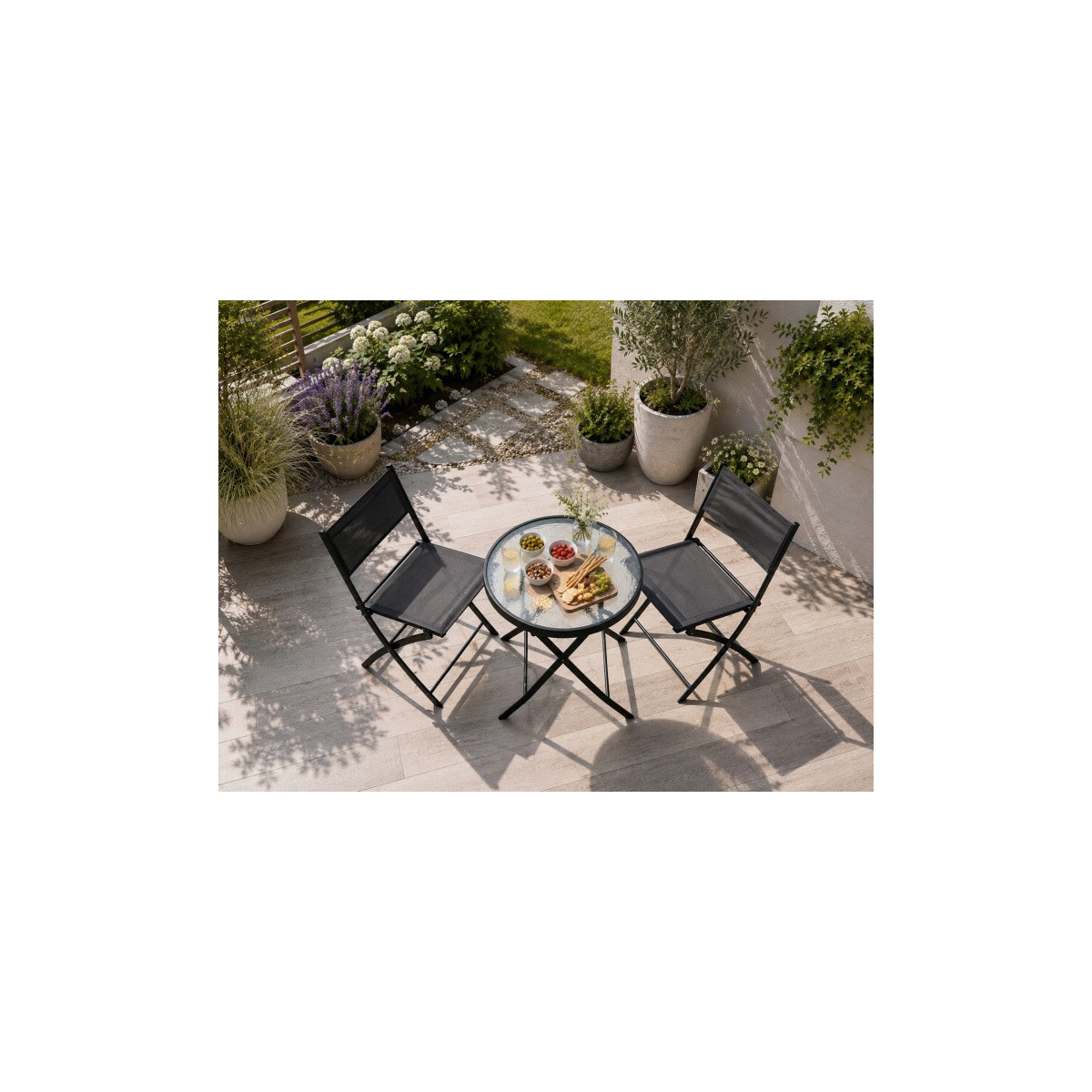Set pliabil de balcon pentru 2 persoane – masă rotundă și 2 scaune de culoare neagră.