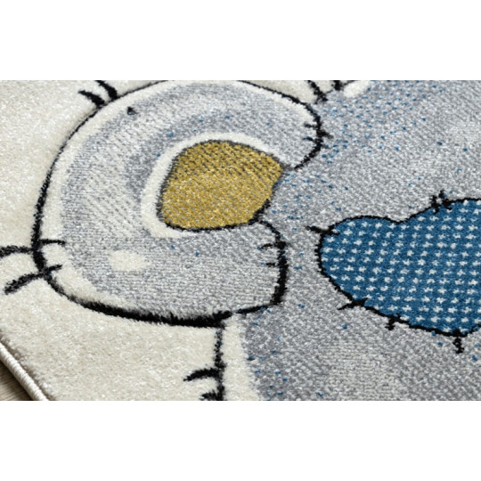 Un covor de calitate pentru copii de culoare bej cu un urs.