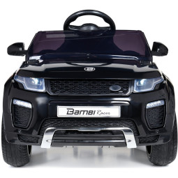 Mașină electrică de copil de calitate, cu comandă, de culoare neagră.